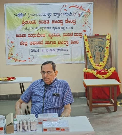 Doctor attending patients at the free health camp, K.R. Nagar